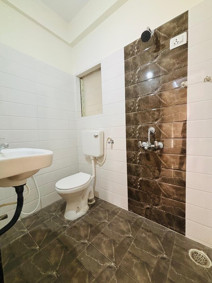 Bathroom, pinnacle-nano-city 1 Bedroom 571 Sq.Ft. Apartment In Joveli Thane 9216064