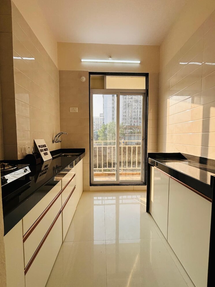 Kitchen, pinnacle-nano-city 1 Bedroom 571 Sq.Ft. Apartment In Joveli Thane 9216064