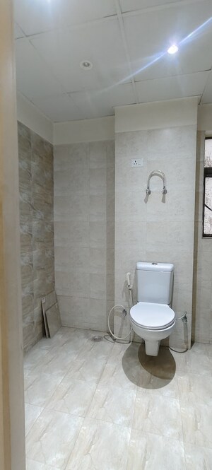 Bathroom in 2.5 BHK Apartment at Sector 16b – for Sale