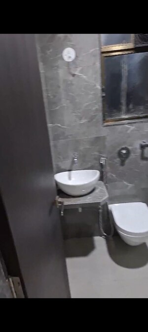 Bathroom in 1 BHK Apartment at Vaishno Sky, Malad East – for Rent