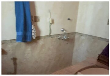 Bathroom in 2 BHK Apartment at Seven Bungalow, Andheri West – for Sale
