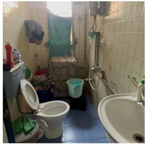 Bathroom in 2 BHK Apartment at Seven Bungalow, Andheri West – for Sale