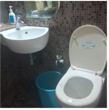 Attached Bathroom in 1.5 BHK Apartment at DLH New Chandra CHS, Andheri West – for Sale
