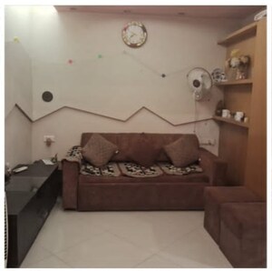 Living Room in 1.5 BHK Apartment at DLH New Chandra CHS, Andheri West – for Sale
