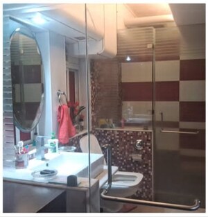 Bathroom in 1.5 BHK Apartment at DLH New Chandra CHS, Andheri West – for Sale