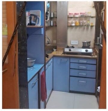 Kitchen in 1.5 BHK Apartment at DLH New Chandra CHS, Andheri West – for Sale