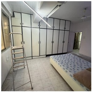 Staircase in 2 BHK Apartment at Seven Bungalow, Andheri West – for Sale