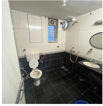 Bathroom in 2 BHK Apartment at Seven Bungalow, Andheri West – for Sale
