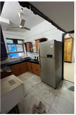 Kitchen in 2 BHK Apartment at Seven Bungalow, Andheri West – for Sale