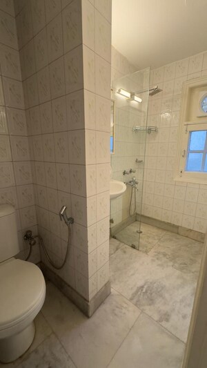 Bathroom in 3 BHK Builder Floor at Defence Colony – for Rent