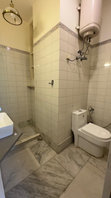 Bathroom in 3 BHK Builder Floor at Defence Colony – for Rent