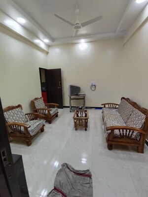 Living Room in 1 BHK Apartment at Strand House, Apollo Bunder – for Rent