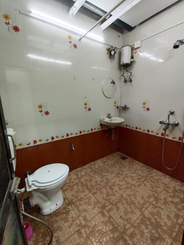 Bathroom in 1 BHK Apartment at Strand House, Apollo Bunder – for Rent
