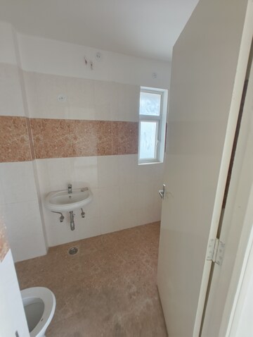 Bathroom in 2.5 BHK Apartment at Unique Sapphire, Mohanpura – for Sale
