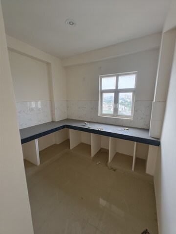 Kitchen in 2.5 BHK Apartment at Unique Sapphire, Mohanpura – for Sale