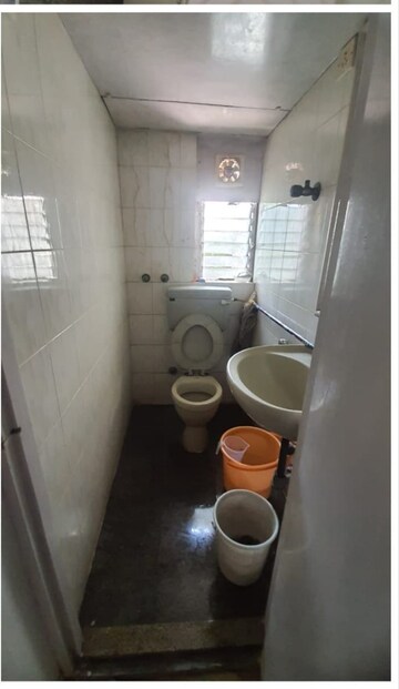 Bathroom in 2 BHK Apartment at Andheri CHS, Andheri West – for Rent