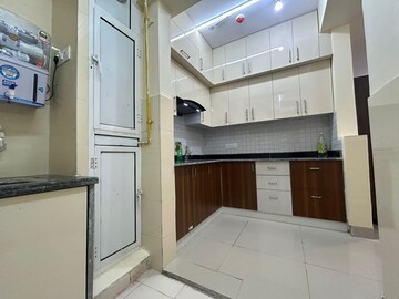 Kitchen in 2 BHK Apartment at La Residentia, Tech Zone 4 Greater Noida – for Rent