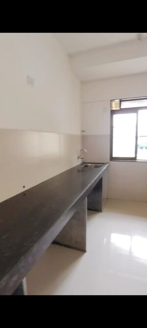 Kitchen in 2 BHK Apartment at Acme Ozone, Manpada – for Sale
