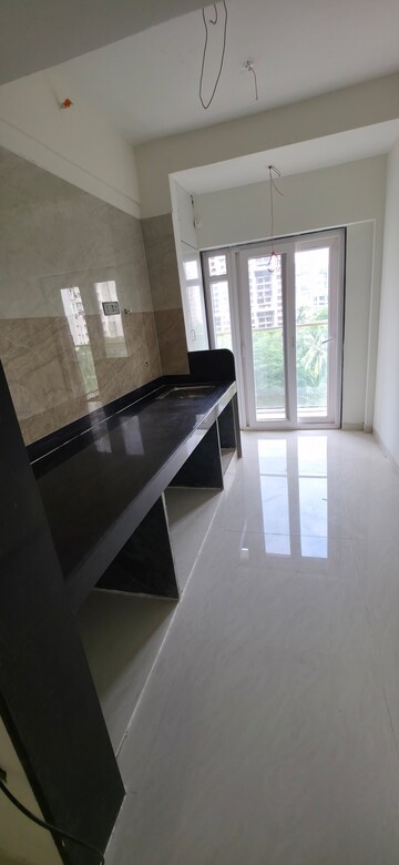 Kitchen in 2 BHK Apartment at Sheth Irene, Malad West – for Sale