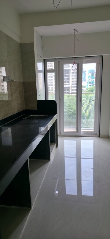 Kitchen in 2 BHK Apartment at Sheth Irene, Malad West – for Sale