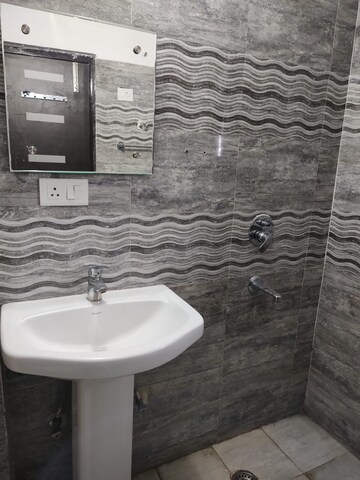 Bathroom in 3 BHK Apartment at Omega Orchid Heights, Faizabad Road – for Rent