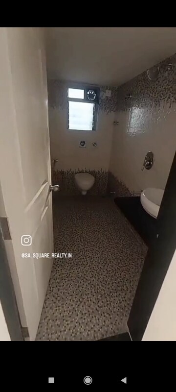 Bathroom in 1 BHK Apartment at Kanakia Ananta, Mira Road – for Rent
