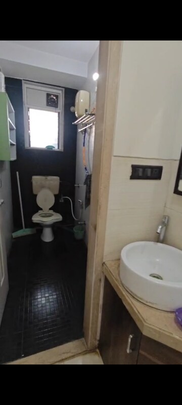 Bathroom in 3 BHK Apartment at Vijay Nagari Annex, Waghbil – for Rent