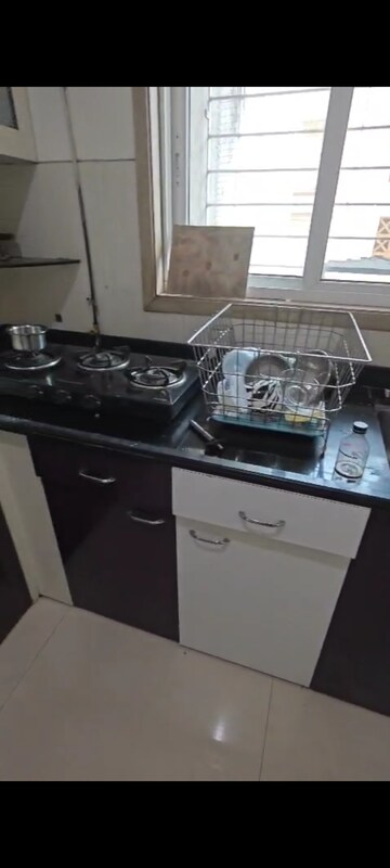 Kitchen in 3 BHK Apartment at Vijay Nagari Annex, Waghbil – for Rent