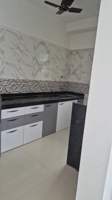 Kitchen in 1 BHK Apartment at DGS Sheetal Tapovan, Malad East – for Rent