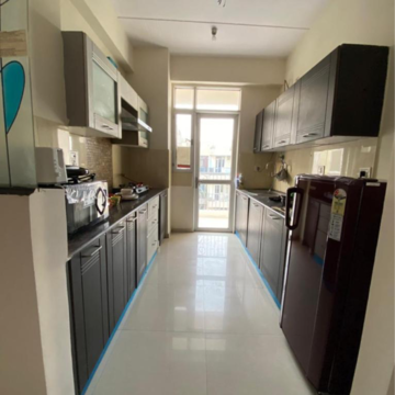 Kitchen in 3 BHK Apartment at Prateek Laurel, Sector 120 – for Rent