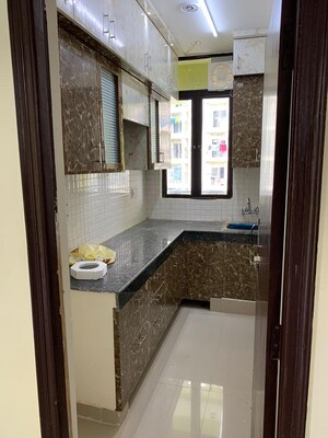 Kitchen in 3 BHK Apartment at Devika Gold Homz, Sector 1 Greater Noida – for Rent