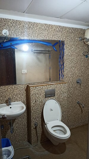 Bathroom in 1.5 BHK Apartment at Lodha Palava Downtown, Dombivli East – for Rent