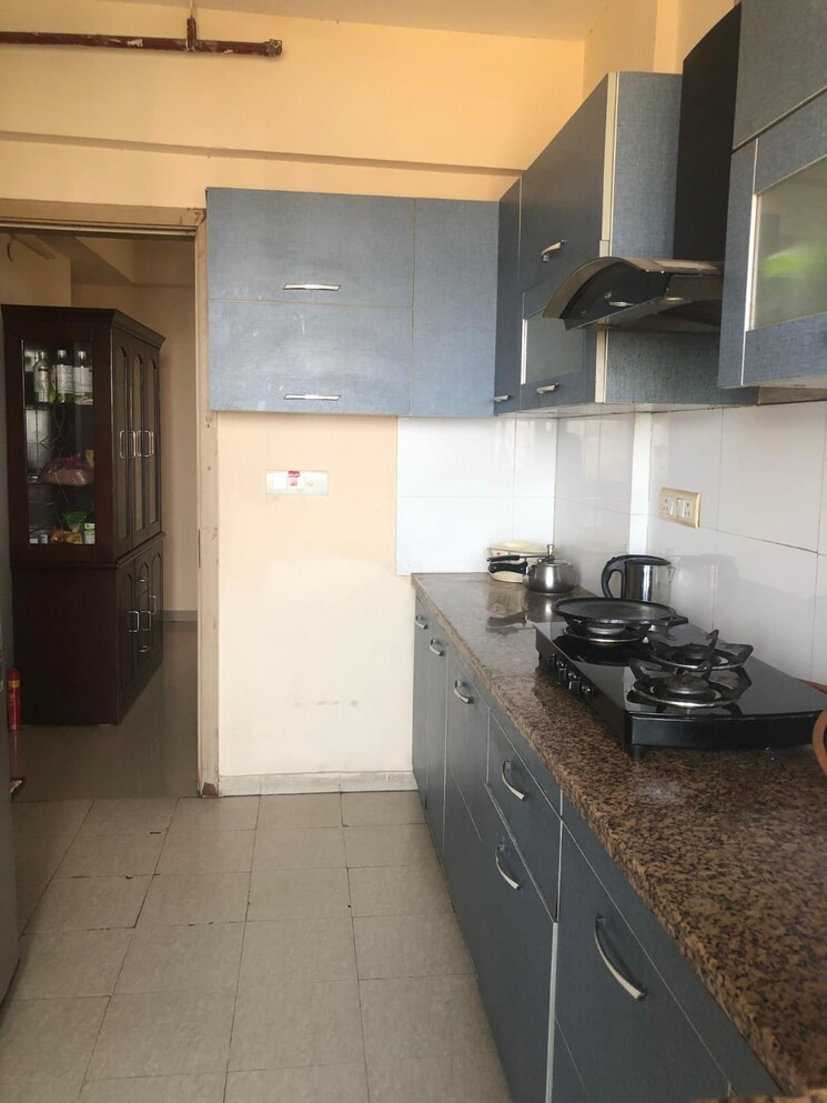Kitchen, dlf-new-town-heights-i 3.5 Bedroom 1930 Sq.Ft. Apartment In Sector 90 Gurgaon 9216683