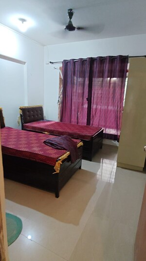 Living Room in 2 BHK Apartment at Bhoomi Park, Malad West – for Rent