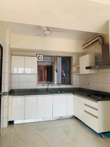 Kitchen in 4 BHK Apartment at Tata Primanti-Tower Residences, Sector 72 – for Sale