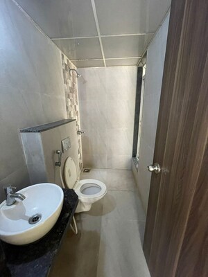 Bathroom in 1 BHK Apartment at JP North Estella, Mira Road – for Rent
