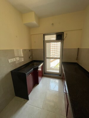 Kitchen in 1 BHK Apartment at JP North Estella, Mira Road – for Rent