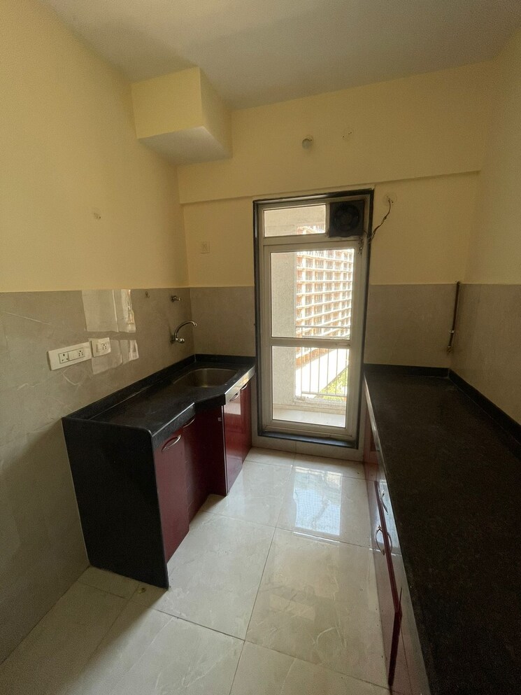 Kitchen, jp-north-estella 1 Bedroom 396 Sq.Ft. Apartment In Mira Road Thane 9216711