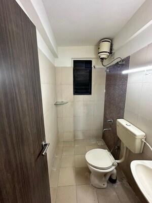 Bathroom in 3 BHK Apartment at Nirmal Polaris, Mulund West – for Rent