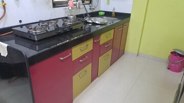 Kitchen in 2 BHK Apartment at Cosmos Lounge, Manpada – for Rent