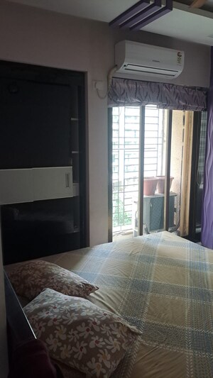 Bedroom in 2 BHK Apartment at Cosmos Lounge, Manpada – for Sale