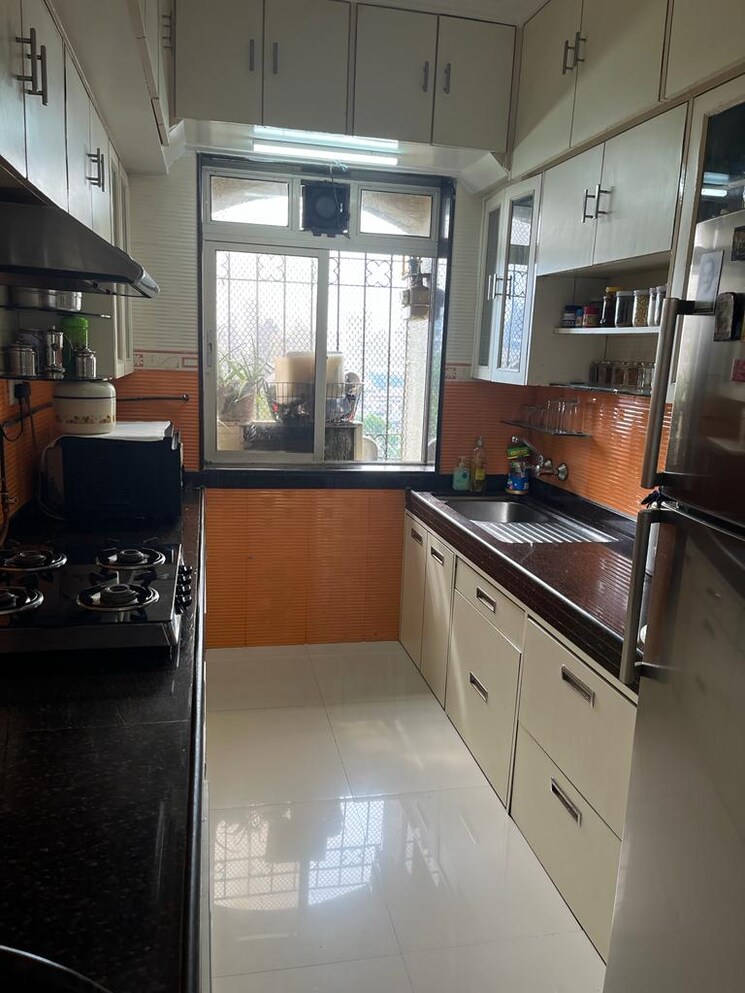 Kitchen, ajmera-bhakti-park 2 Bedroom 955 Sq.Ft. Apartment In Bhakti Park Mumbai 9217190