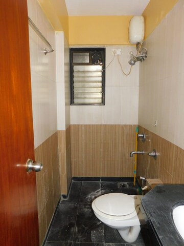 Bathroom in 2 BHK Apartment at Julian Alps, Bhakti Park – for Rent