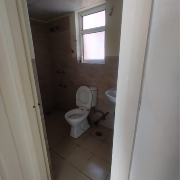Bathroom in 2 BHK Apartment at Wave Dream Homes, Ram Nagar – for Rent