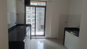 Kitchen in 2.5 BHK Apartment at Shree Satya Shankar Residency, Manpada – for Sale