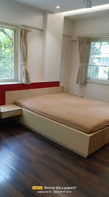 Bedroom in 2 BHK Apartment at Dharam Jyot CHS, Juhu – for Rent