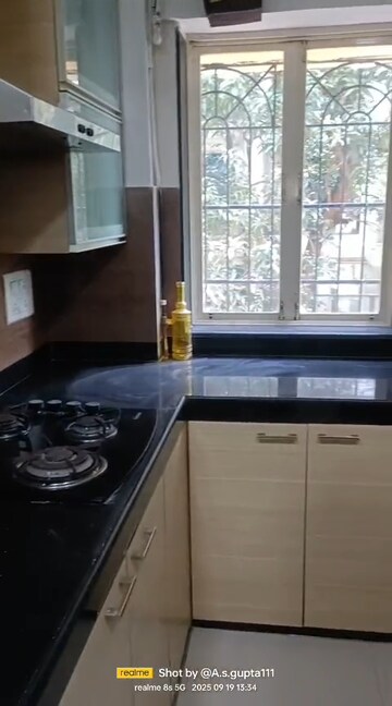 Kitchen in 2 BHK Apartment at Dharam Jyot CHS, Juhu – for Rent