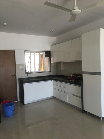 Kitchen in 2 BHK Apartment at Shapoorji Pallonji Vanaha Golfland, Bavdhan – for Rent