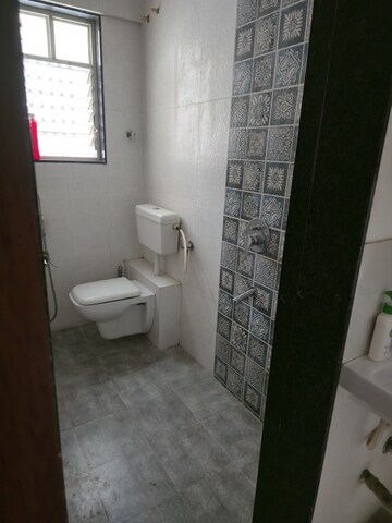 Bathroom in 2 BHK Apartment at Shapoorji Pallonji Vanaha Golfland, Bavdhan – for Rent