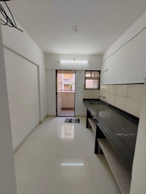 Building Lobby in 2 BHK Apartment at Abhinav Pebbles Urbania, Bavdhan – for Rent